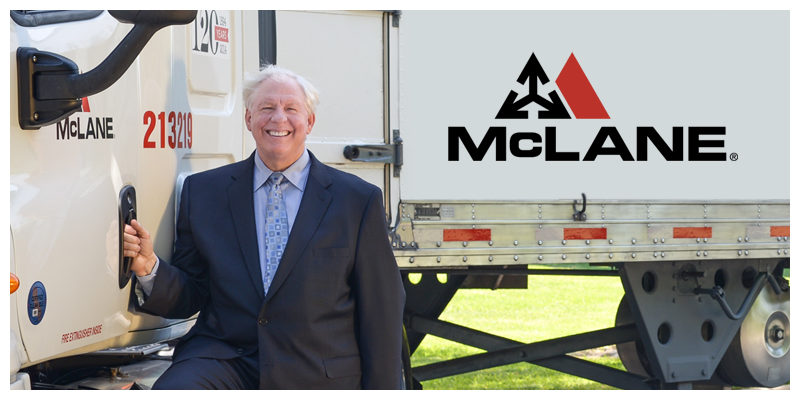 Photo of Grady Rozier next to a McLane Co. truck