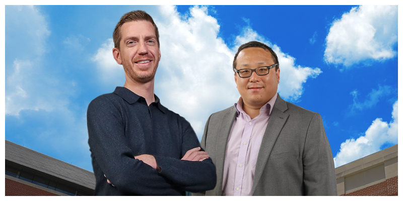 Russell Browder and Justin Yan smiling in front of a blue cloudy sky